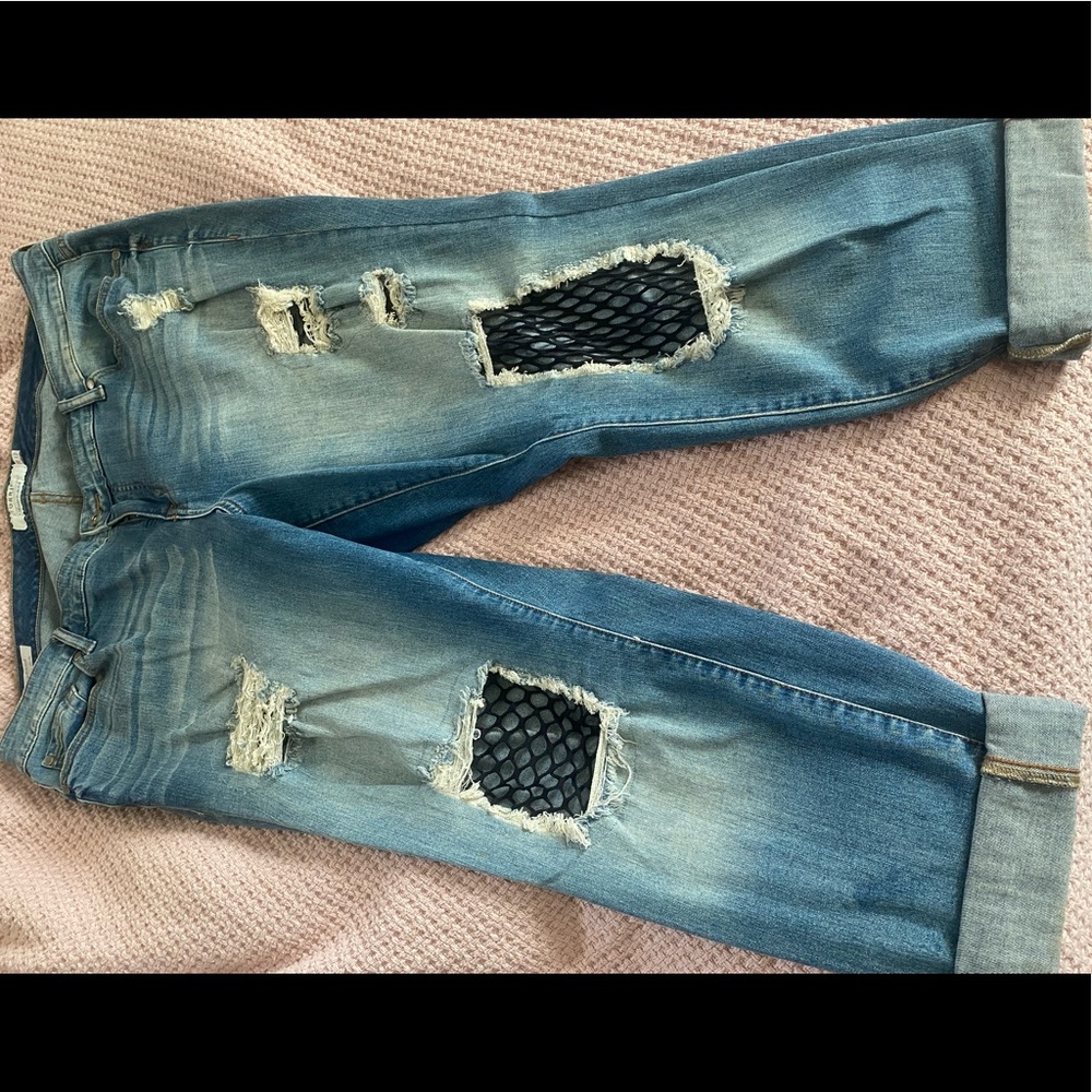 Torrid cropped distressed jeans with fishnet
